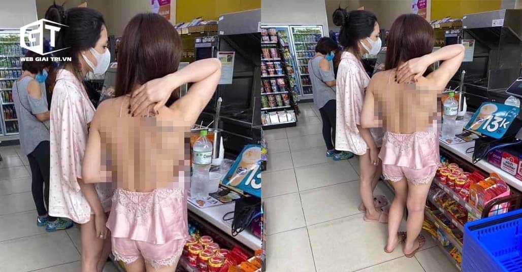 Cô gái mặc áo hở hết lưng, lộ vòng 1 hớ hênh vào cửa hàng tiện lợi mua đồ ngày dịch gây phản cảm tột độ